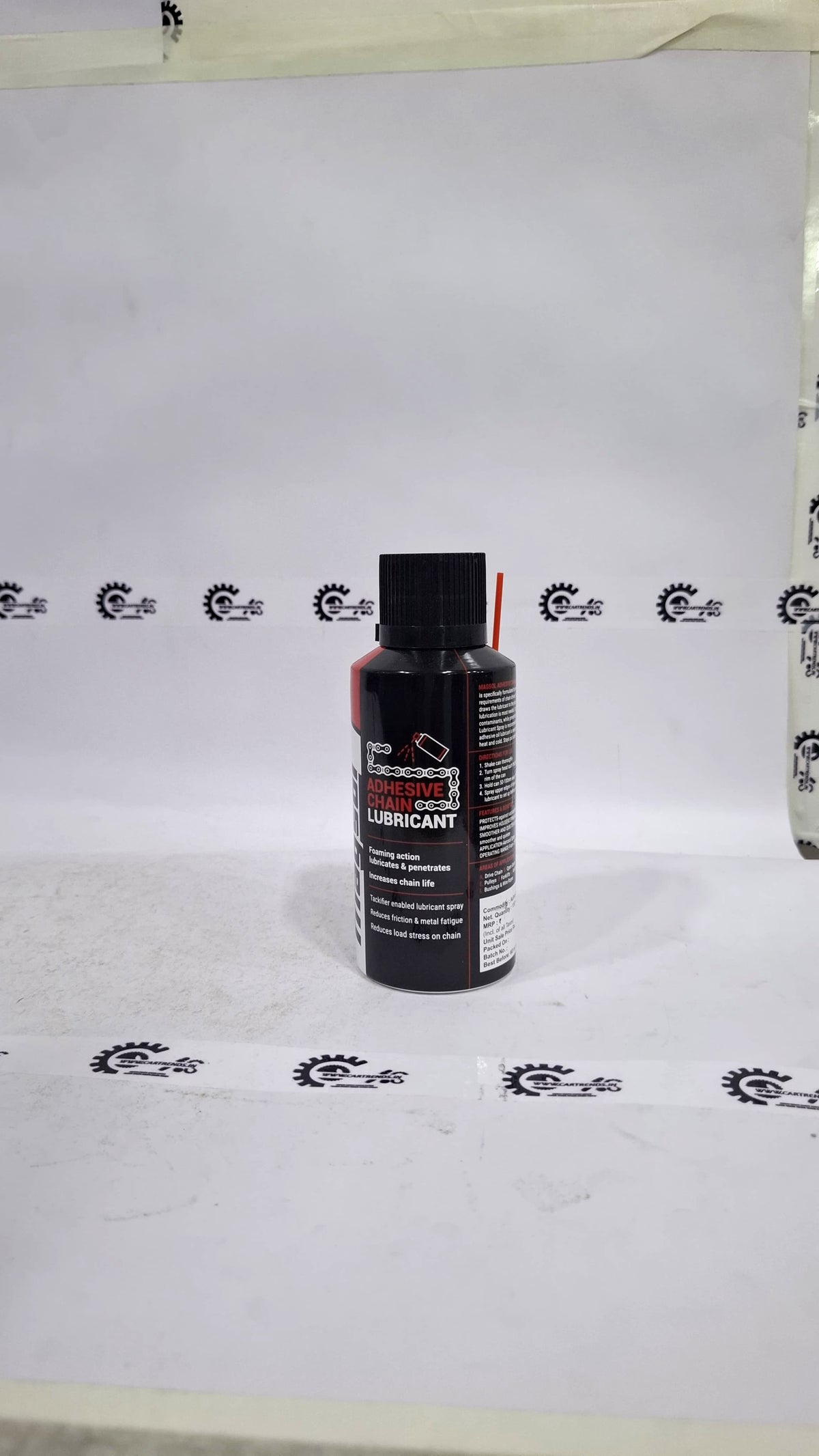 CarTrends Magsol Adhesive Chain Lubricant spray for motorcycle and bicycle chains, showing the spray can and chain application.