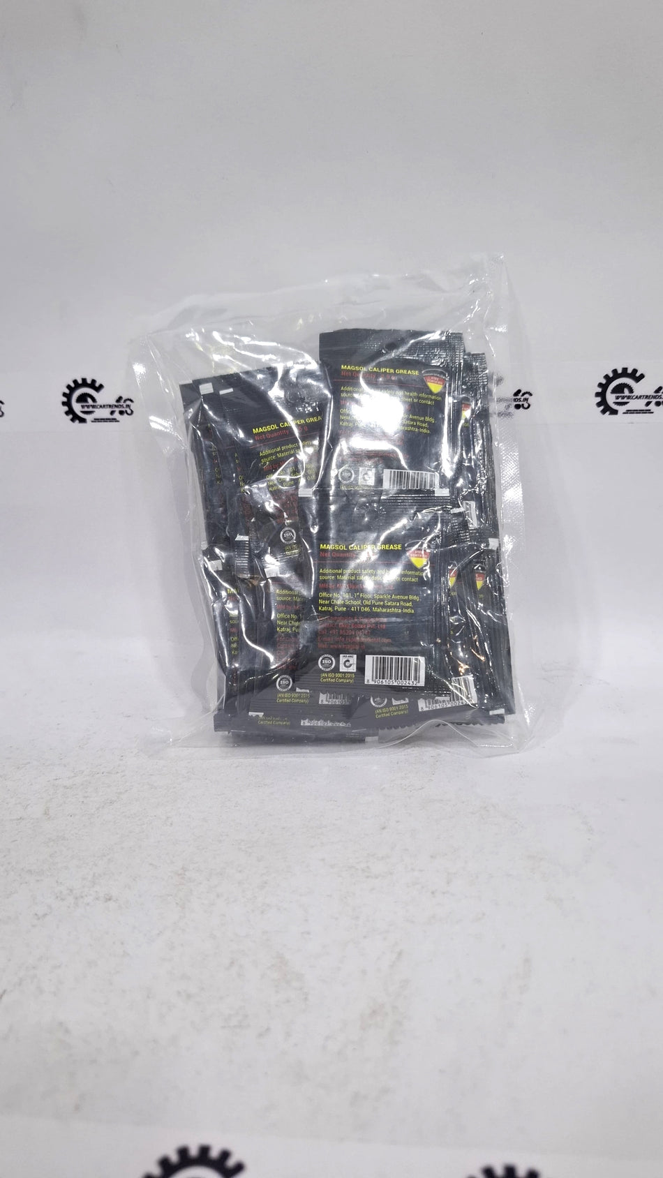 CarTrends Magsol caliper grease tube, high-performance brake caliper lubricant, with a yellow cap and black packaging.