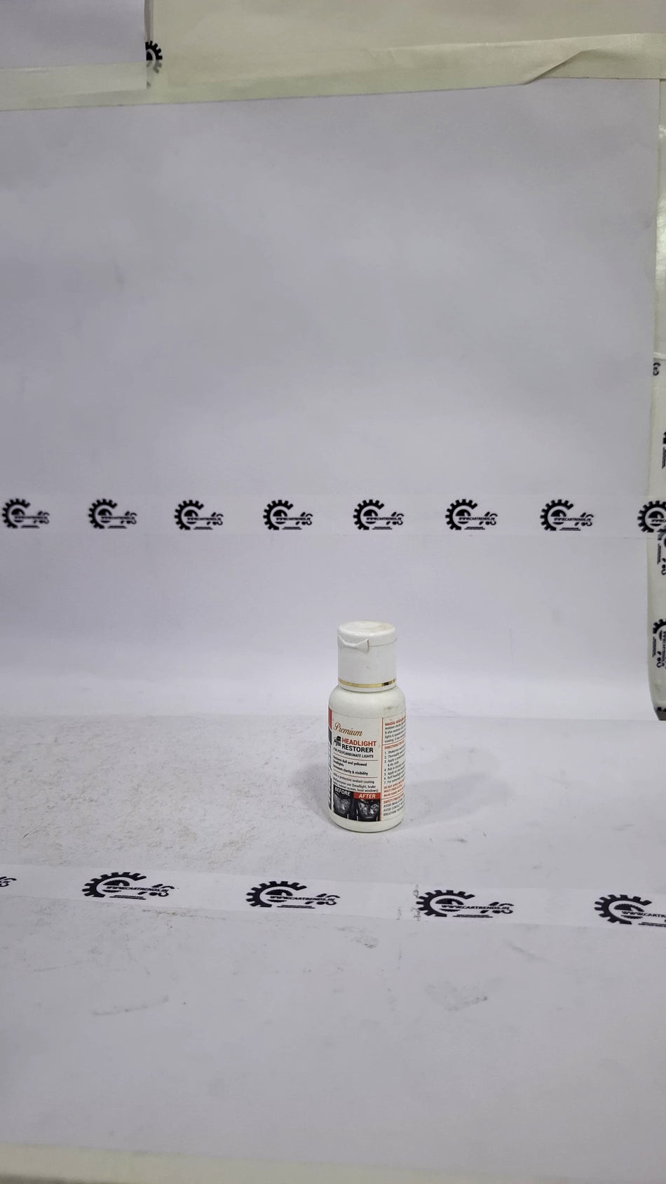 CarTrends Magsol Premium Headlight Restorer bottle showing label and applicator for restoring cloudy or foggy headlights.