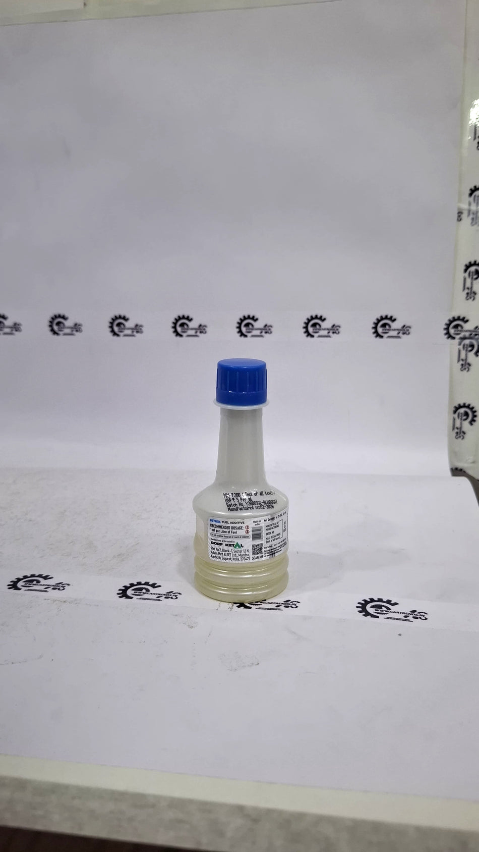 CarTrends Milex Petrol Fuel Additive bottle showing label and packaging for improving fuel efficiency and engine performance.