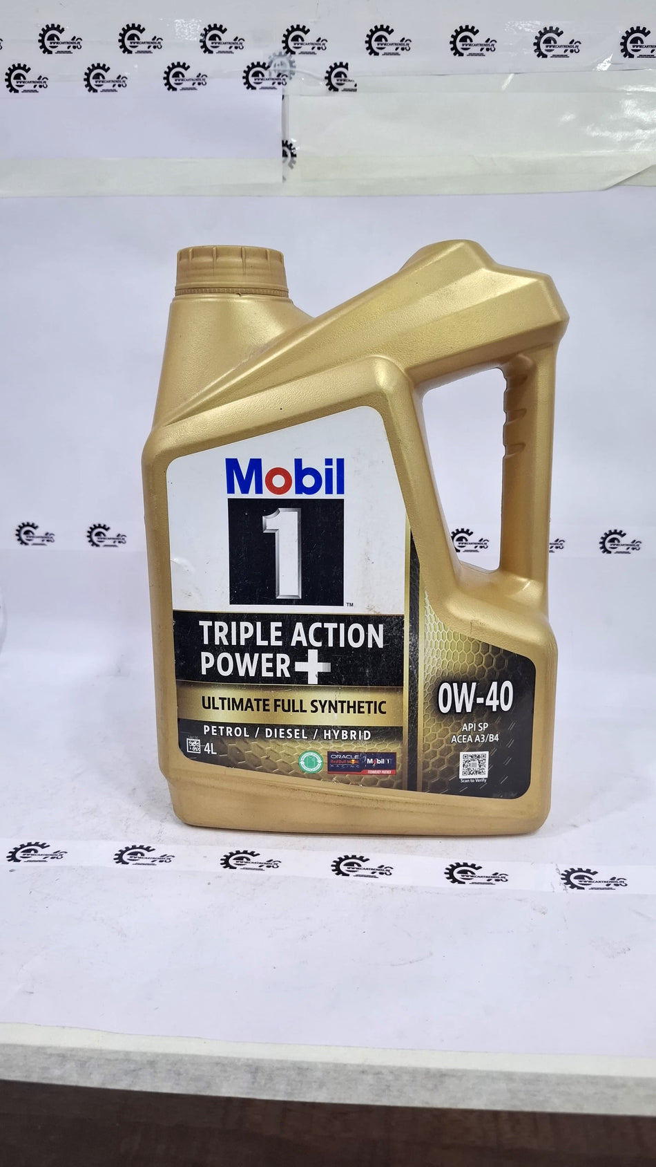 CarTrends Mobil 0W-40 motor oil container, 4-liter size, shown in a clear image with label details.