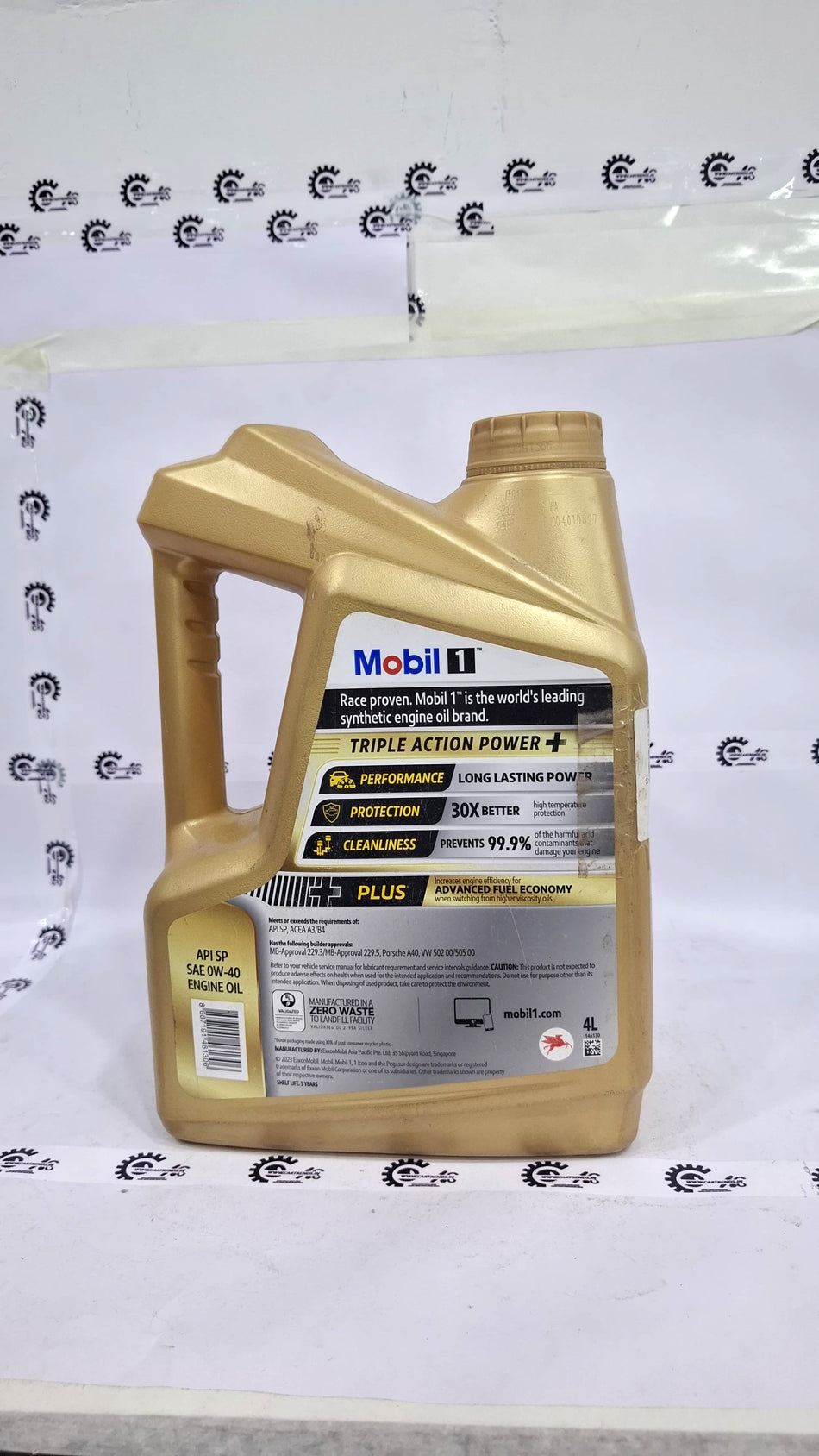 CarTrends Mobil 0W-40 4L motor oil container, black and yellow label, 4-liter size, ready for engine lubrication.