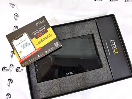 Moco X5 CarTrends Android infotainment system with touchscreen display installed in a vehicle dashboard.