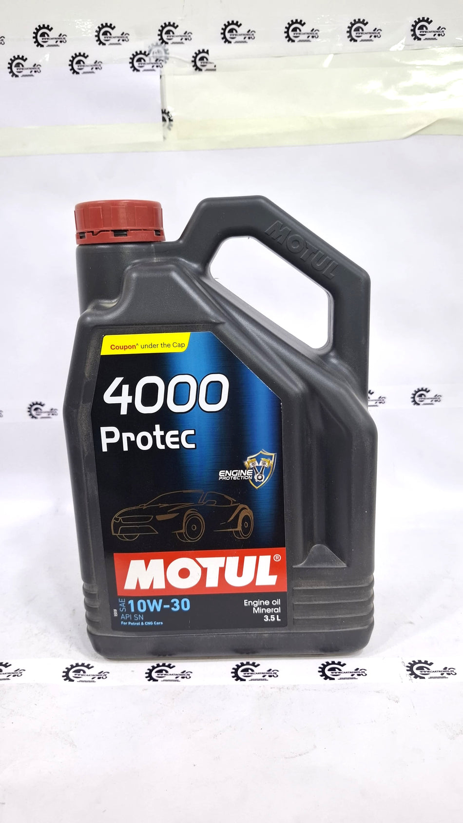 Motor oil bottle labeled Motul 4000 Protec 10W-30 from CarTrends, with a focus on the oil's packaging and branding.