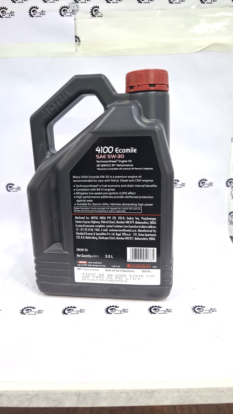 CarTrends Motul 4100 Ecomile 5W-30 engine oil bottle with label and cap, suitable for automotive engine lubrication.