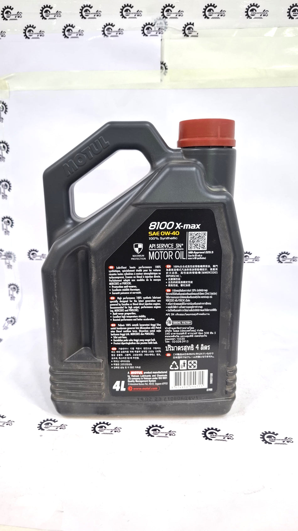 CarTrends Motul 8100 X-max 0W-40 synthetic engine oil container, 100% synthetic motor oil for vehicle engine performance.