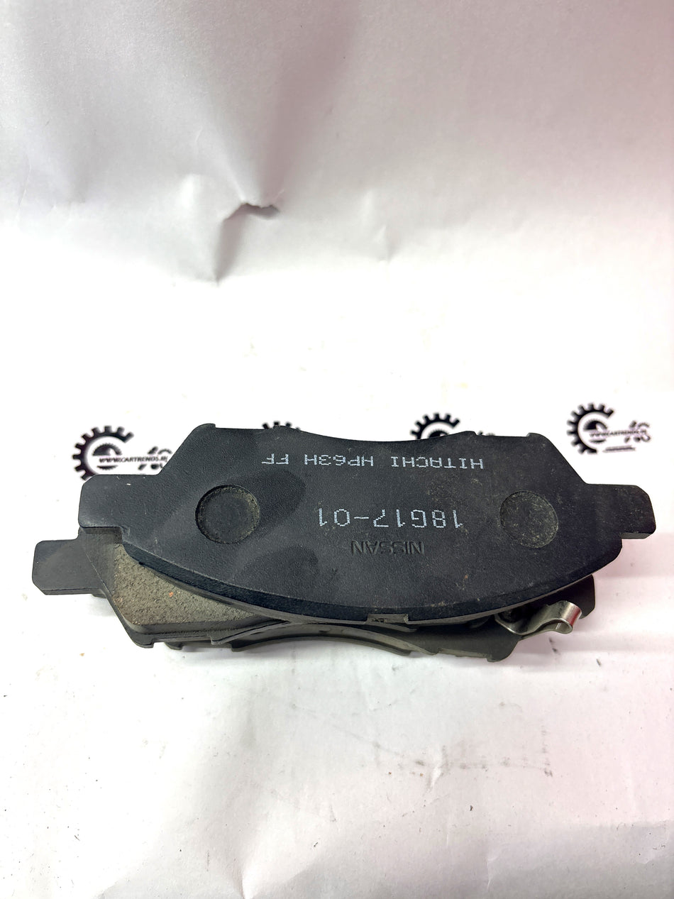 CarTrends disc brake pad kit with multiple brake pads and hardware for vehicle braking system.