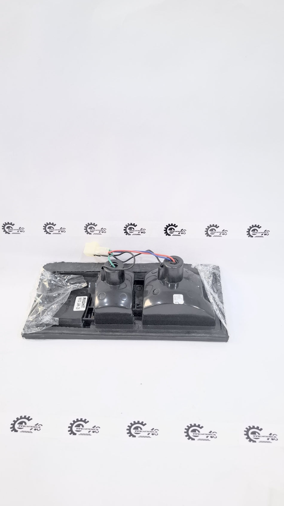 CarTrends TL-6713M automotive part showing a close-up of the product with detailed components and branding.