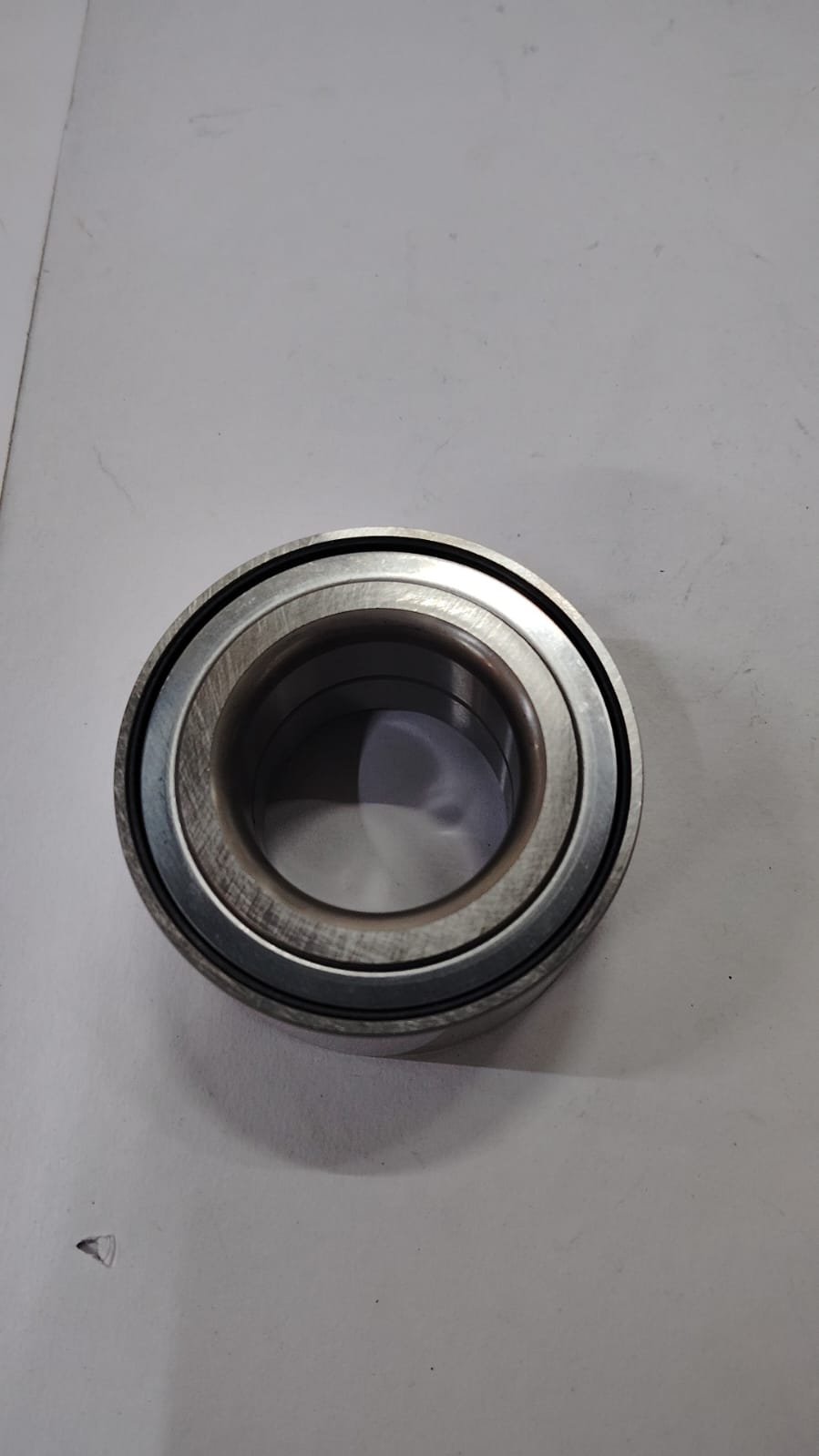 Front wheel bearing for Ford EcoSport by CarTrends, part #BE8Z1215C, showing the bearing assembly installed on the vehicle.