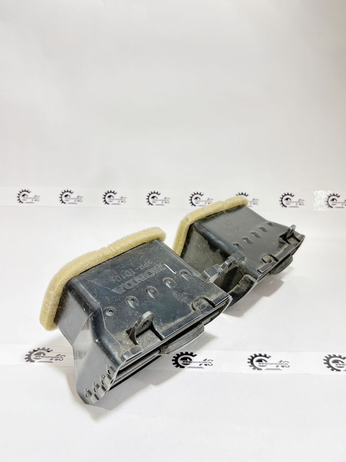 Honda City petrol air vent, CarTrends replacement part, shown in close-up front view with vents and details.