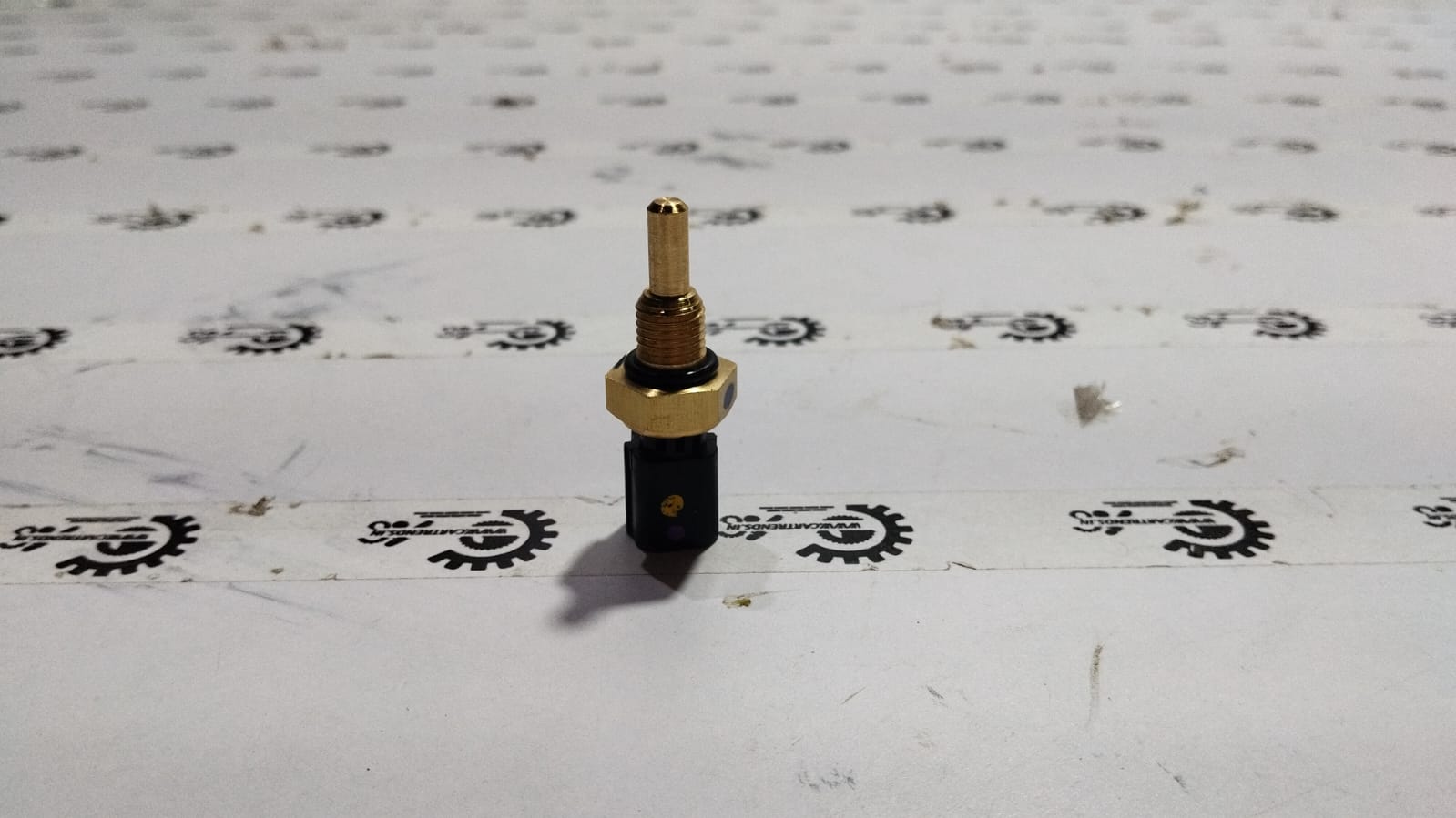 Honda Amaze sensor assembly, CarTrends replacement part, showing the sensor and wiring for engine or sensor system.