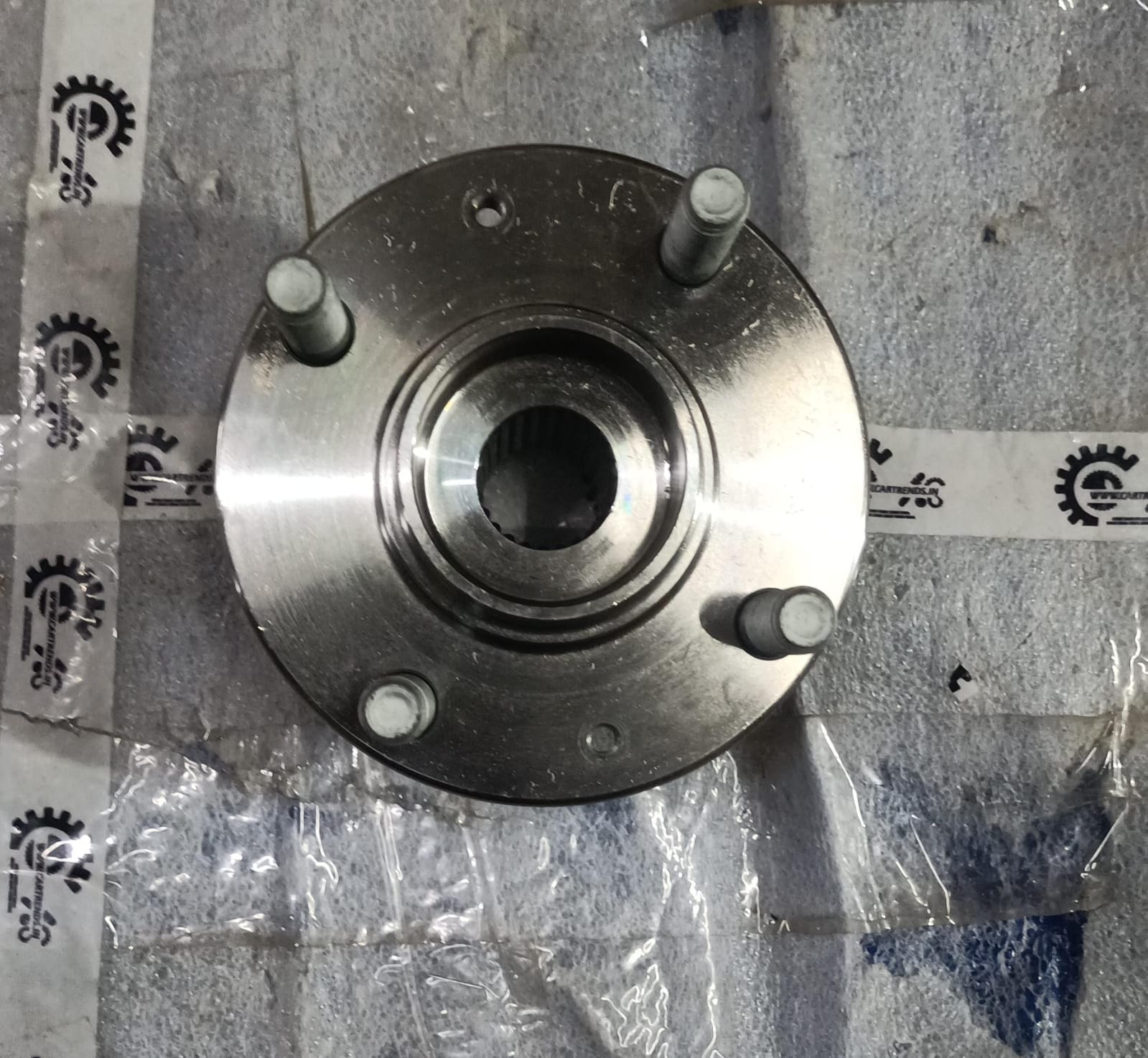 Hyundai CarTrends front wheel hub for Xcent I20 Elite petrol and diesel models, vehicle part in black with mounting details.