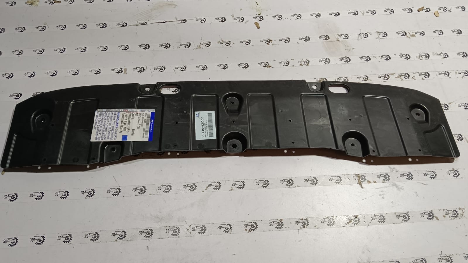 Hyundai Aura CarTrends engine under cover skid plate, vehicle underside protection, black plastic panel with mounting points.