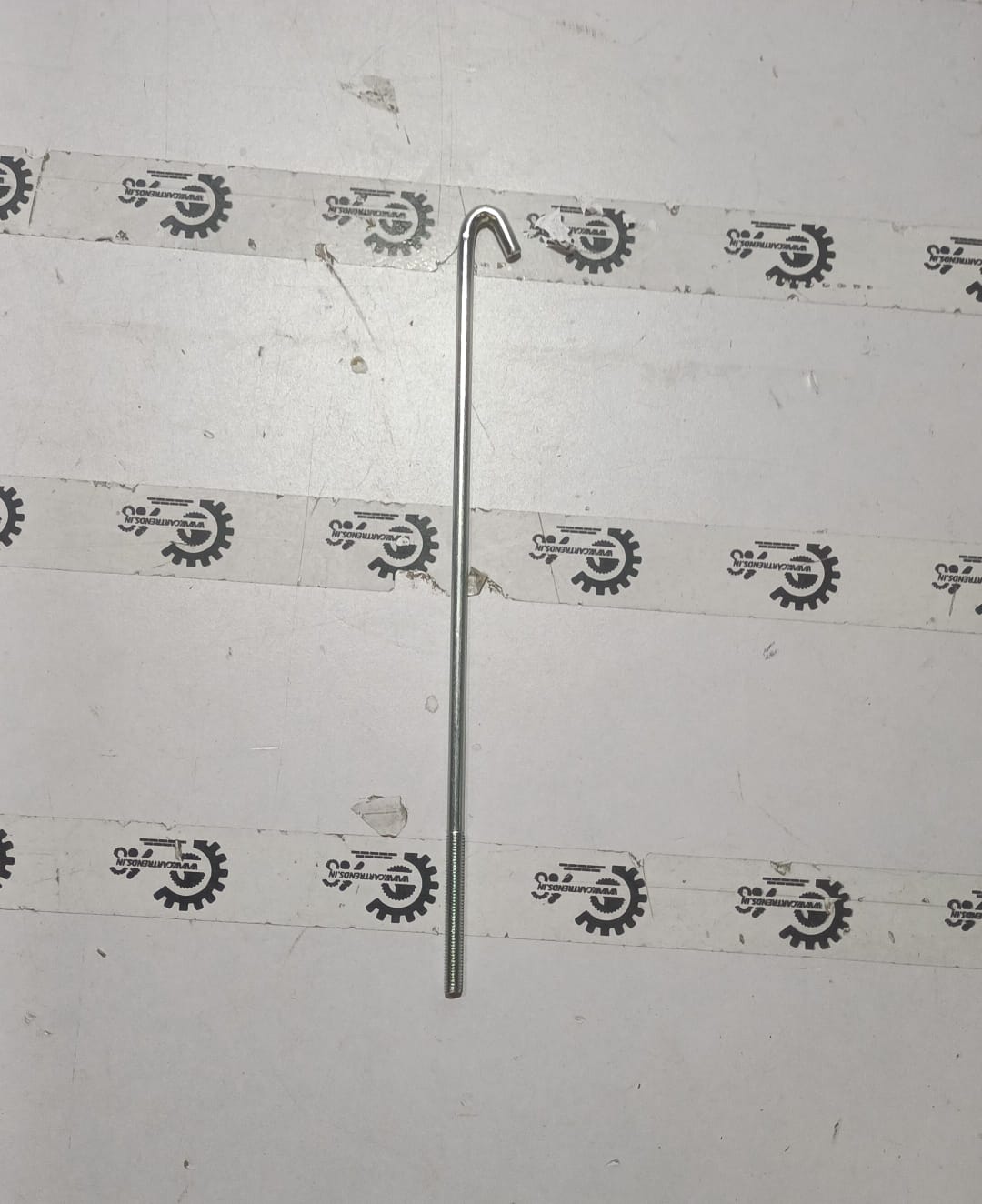 Maruti CarTrends Battery Rod for Spresso, model #63461M75J00, shown in black with metal components on a white background.