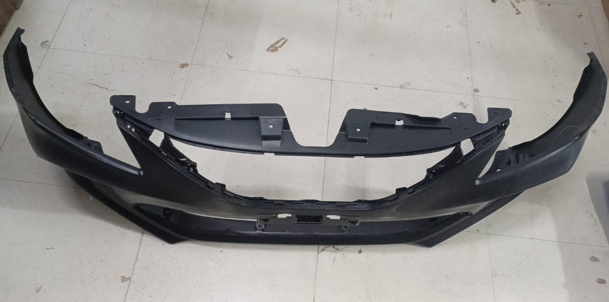 Maruti car front bumper part by CarTrends, model 71711M50S005PK, shown in a close-up image with a black finish.