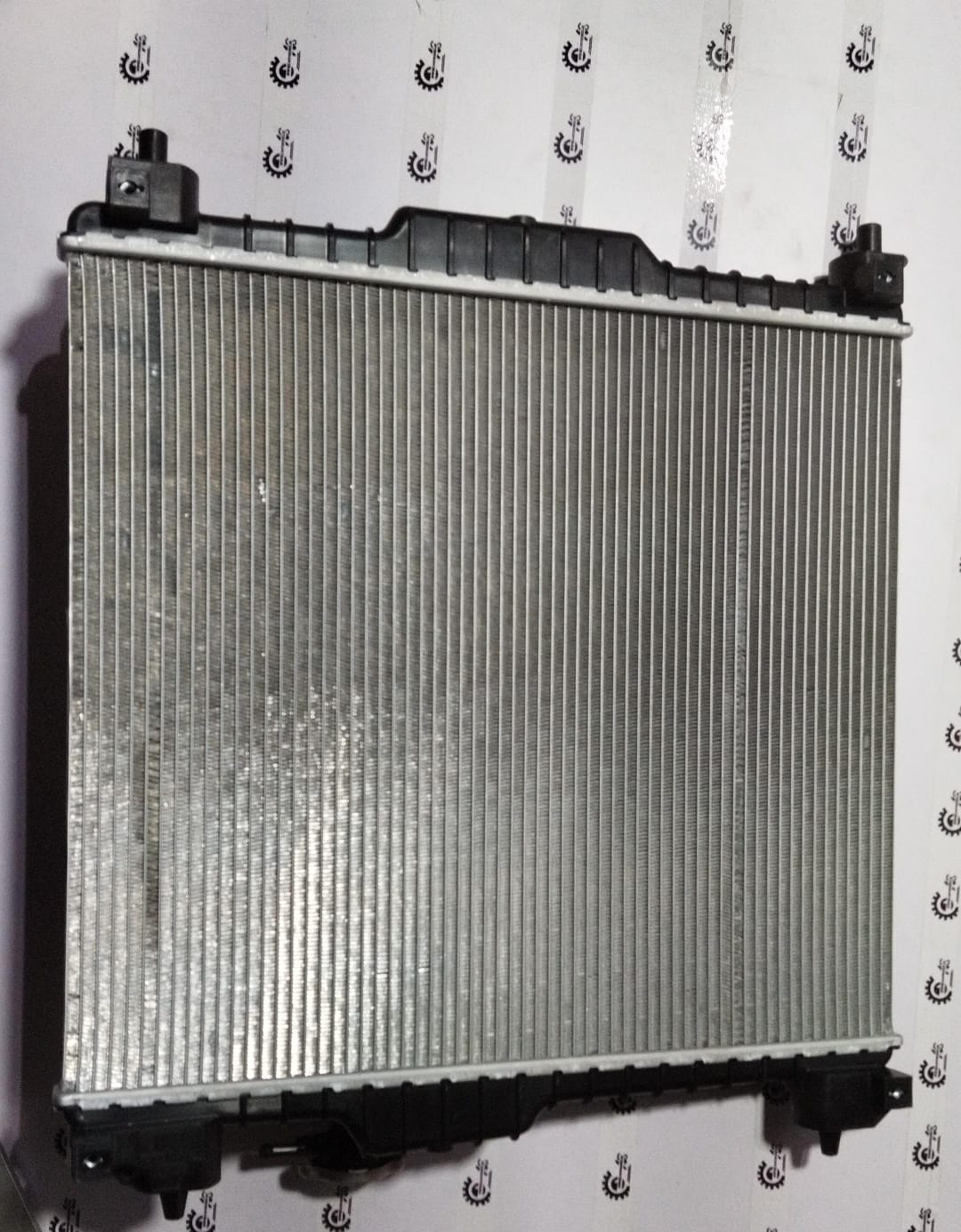 Maruti Celerio 2nd Gen radiator by CarTrends, part number 17700M81R00, shown in a detailed close-up image.