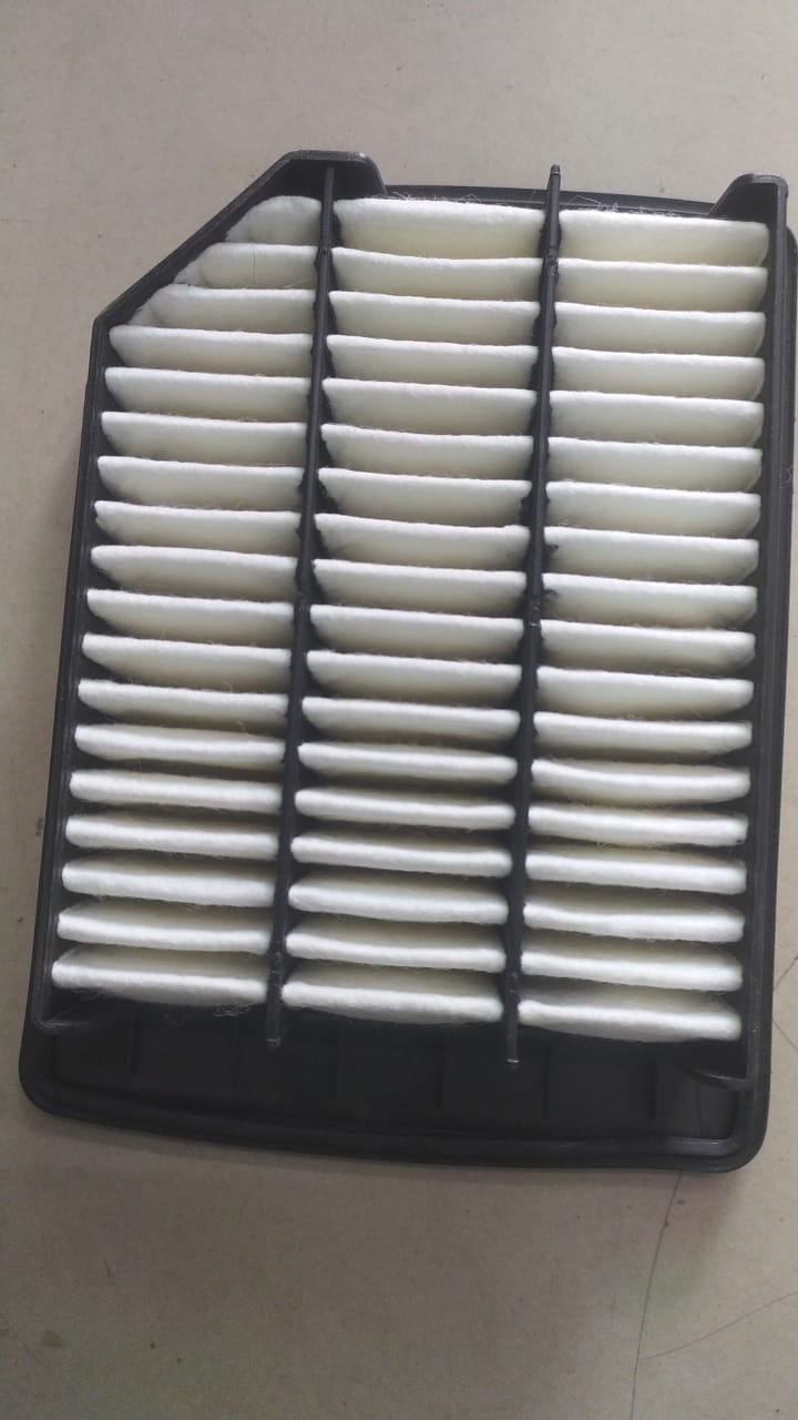 CarTrends air filter for Maruti Suzuki S-Cross, model 13780M65M00, shown installed in the vehicle's engine compartment.