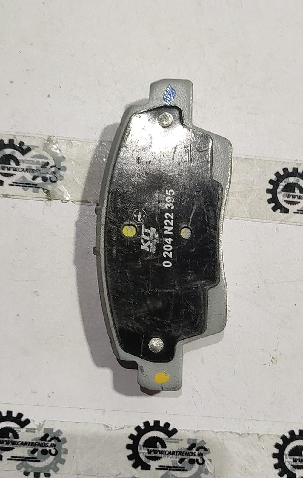 Front brake pad for Nissan Triber and Kiger by CarTrends, part number 410606820R, showing the new brake pad design.