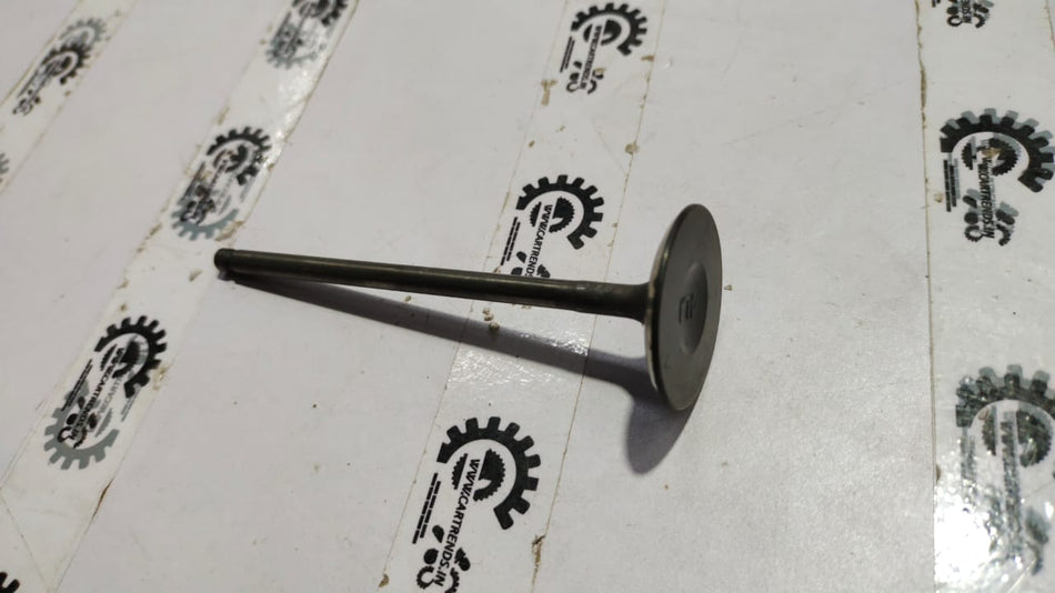 Nissan Micra intake valve by CarTrends, close-up view showing metal component and detailed surface texture.