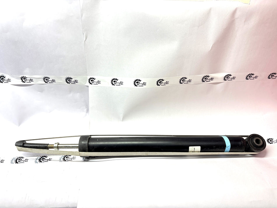 CarTrends shock absorber for vehicle suspension, showing the durable coil and mounting components in close-up view.
