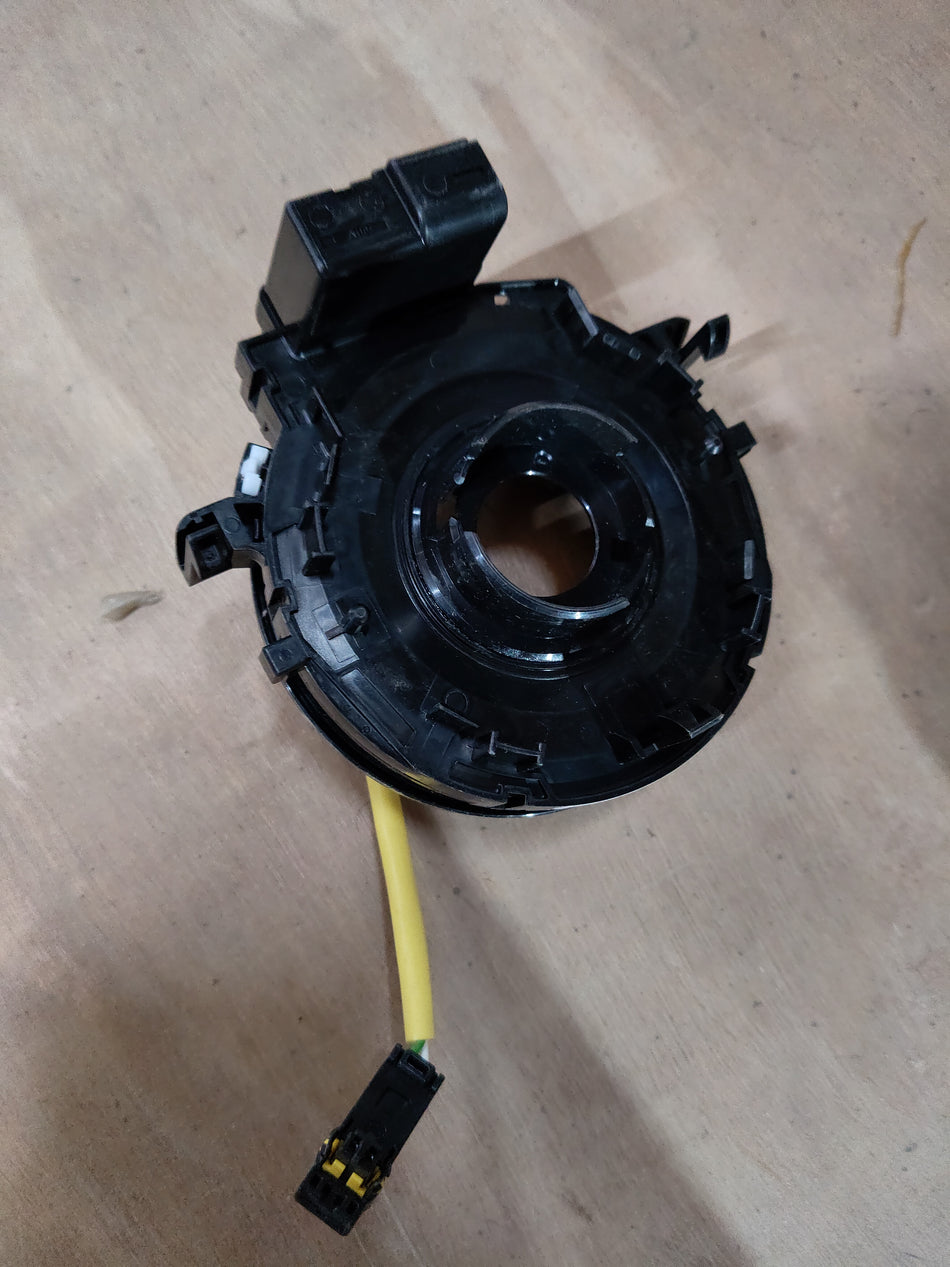 Maruti CarTrends contact coil assembly part 37480M62S00 for Alto K10, shown as a close-up of the coil spring component.