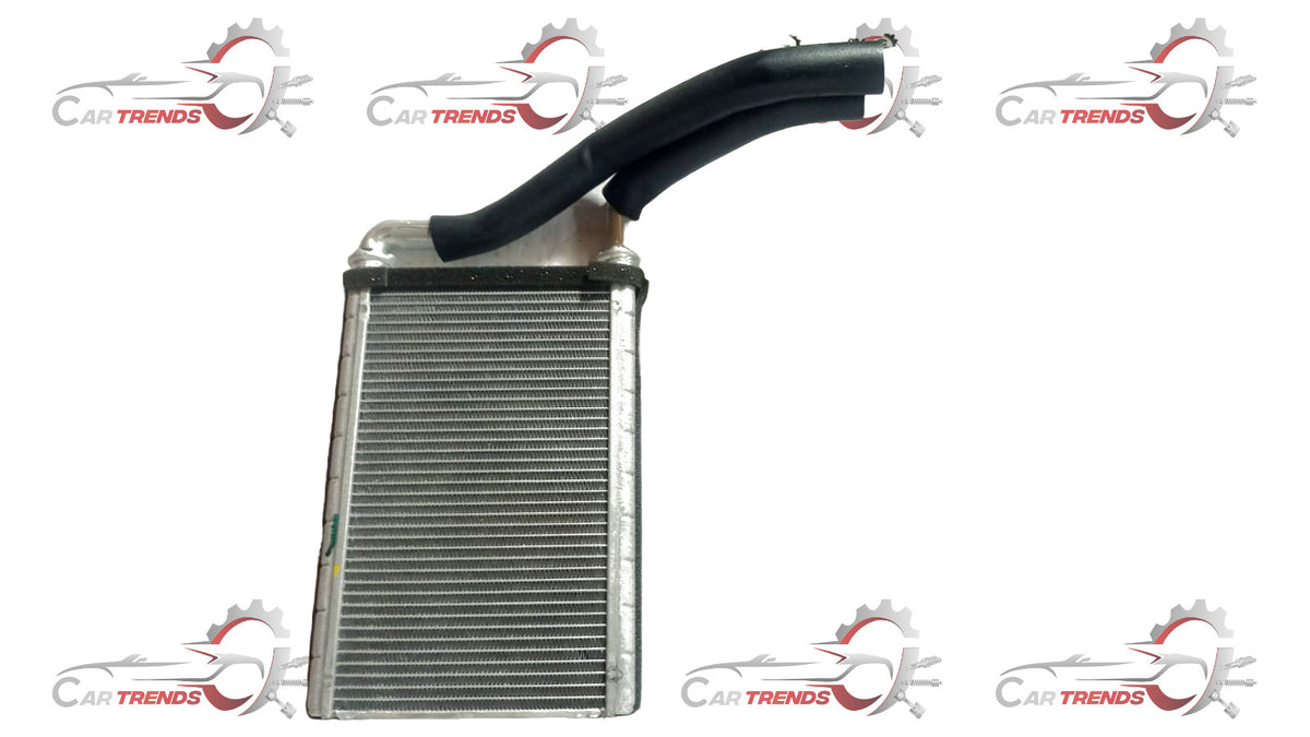 CarTrends heater core for Suzuki Swift Dezire, spare auto parts component, showing the metal core and connection points.