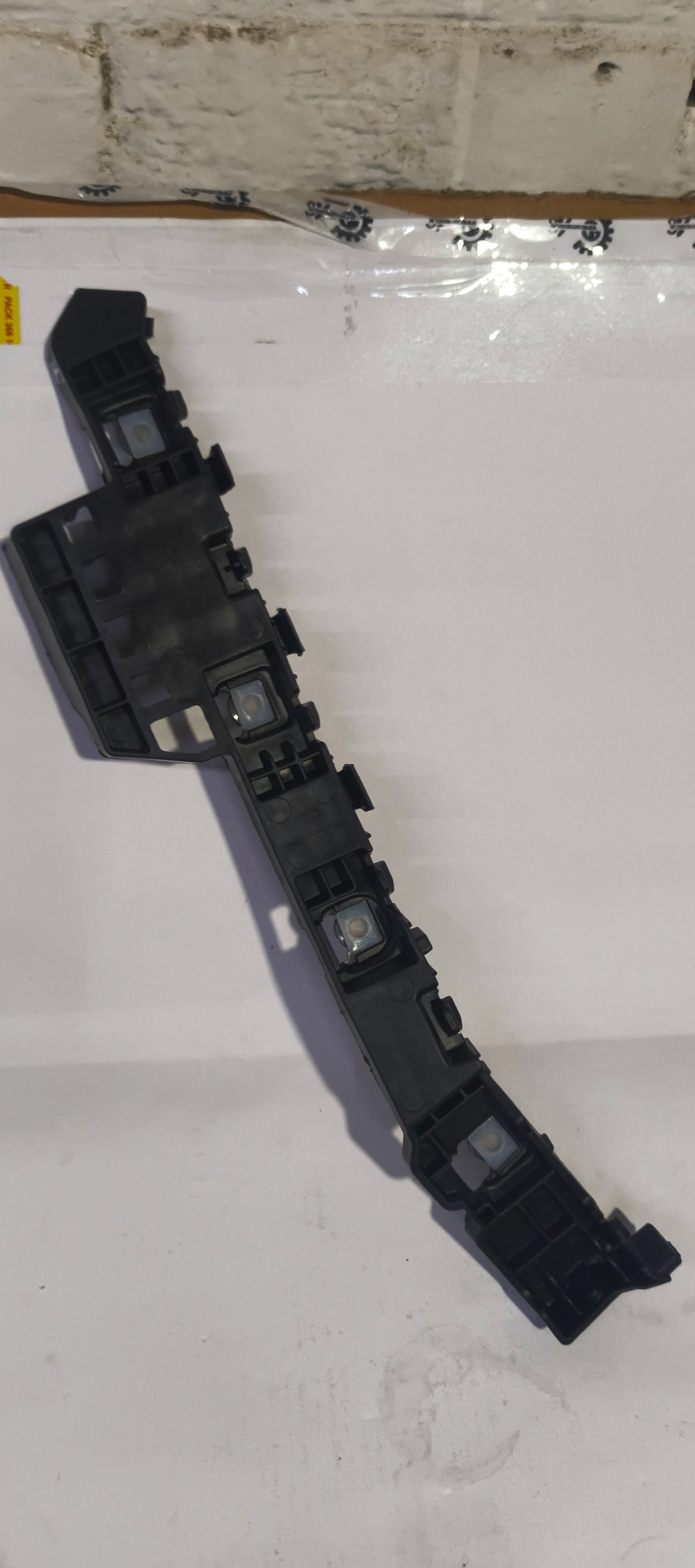 CarTrends rear bumper bracket for Creta, right side, spare car part mounted on vehicle showing bracket attachment