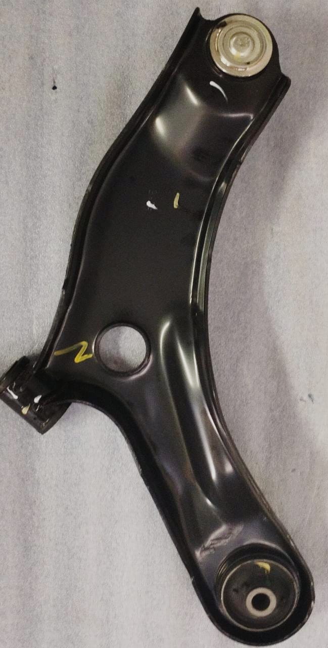 CarTrends front suspension arm assembly for vehicle, showing the metal component with mounting points and bushings.