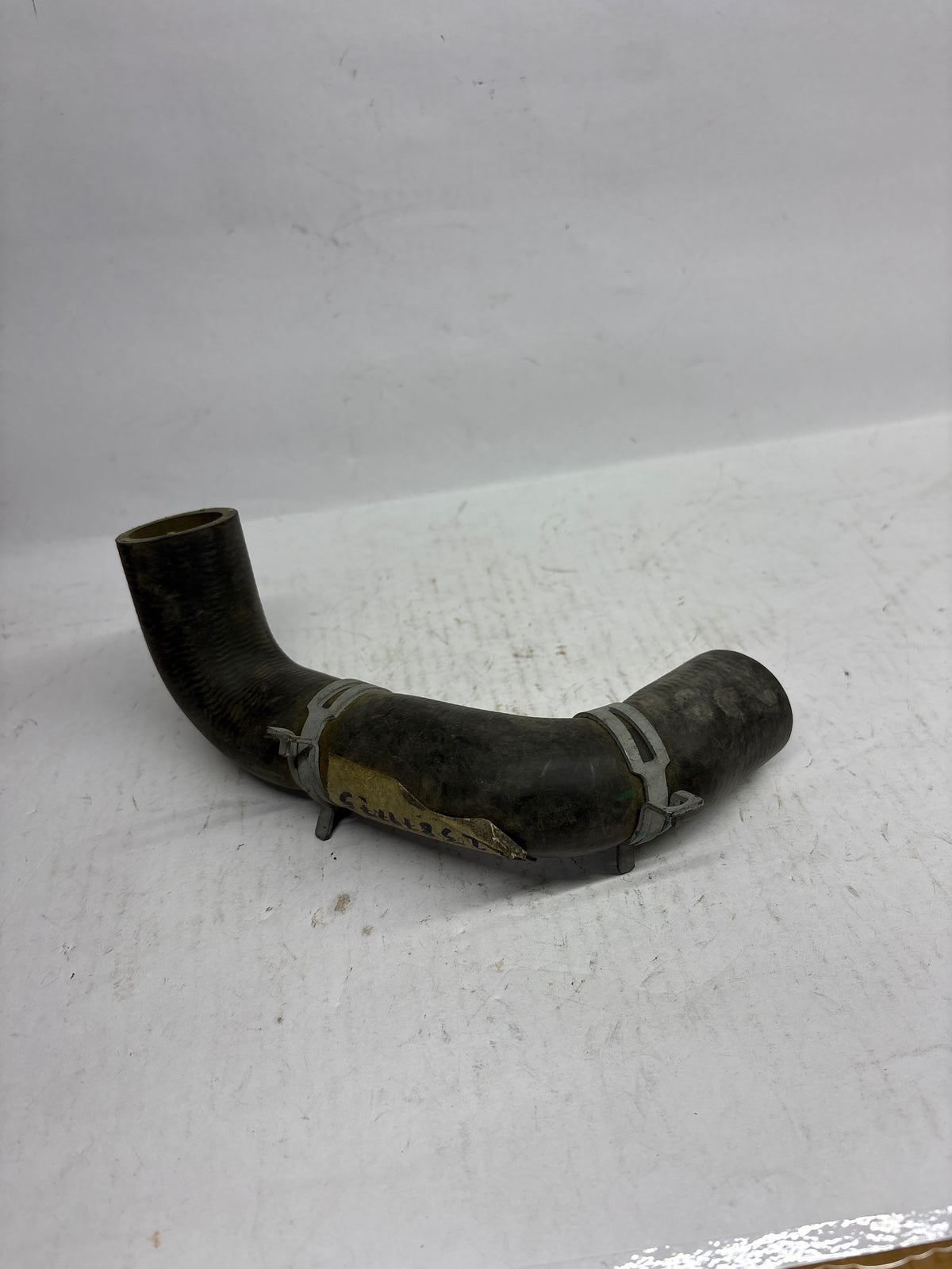 Chevrolet Pipe Assembly by CarTrends, auto spare part for Chevrolet vehicles, shown in black metal with connectors and fittings.