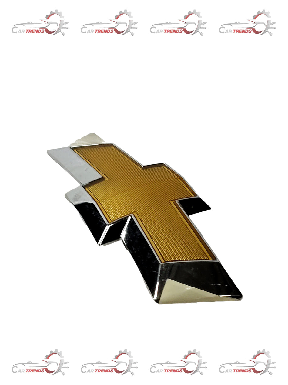 CarTrends Chevrolet Beat front bumper fascia emblem, close-up view of the spare part with branding and mounting details.