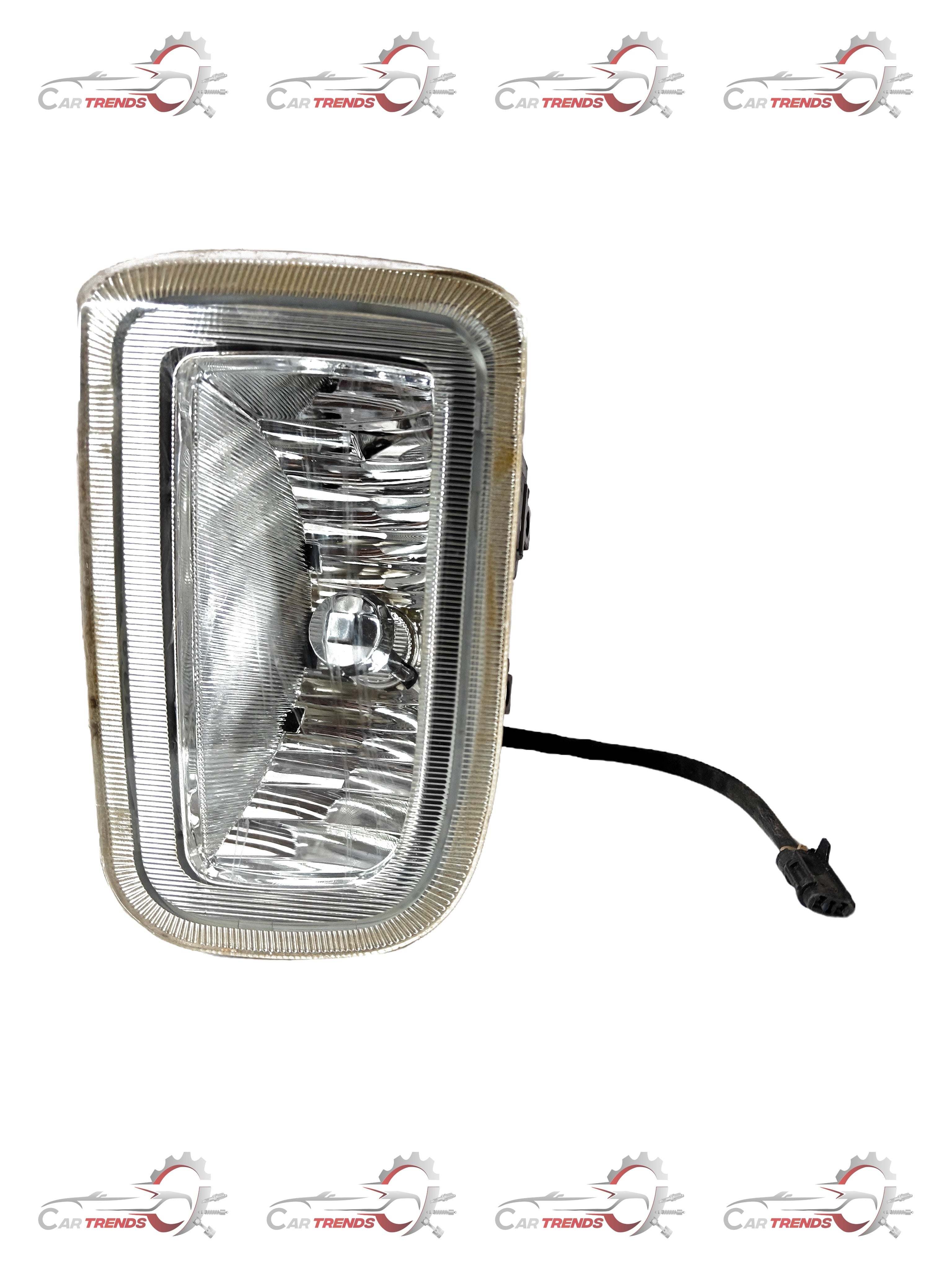 Right fog lamp for Tavera vehicle, spare part by CarTrends, shown in the image with mounting details and clear lens.