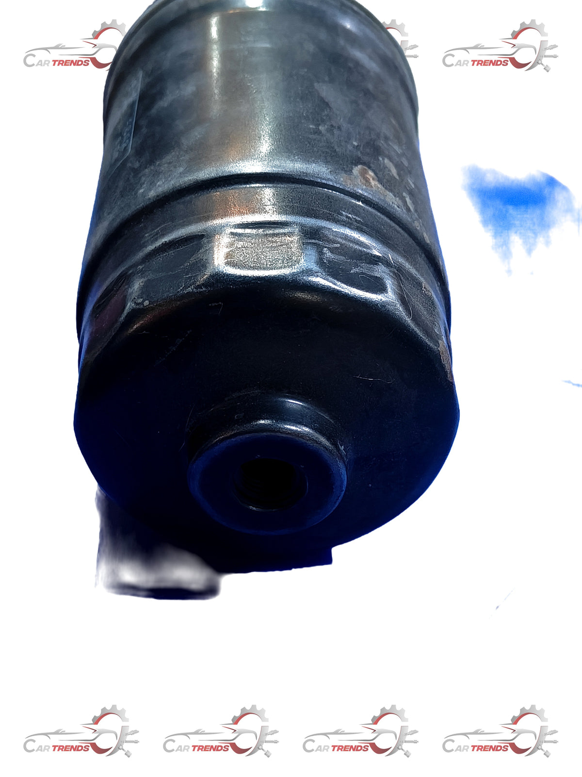 CarTrends fuel filter for Creta, spare part 319222E900, shown in the image with a cylindrical metal design and inlet/outlet ports.