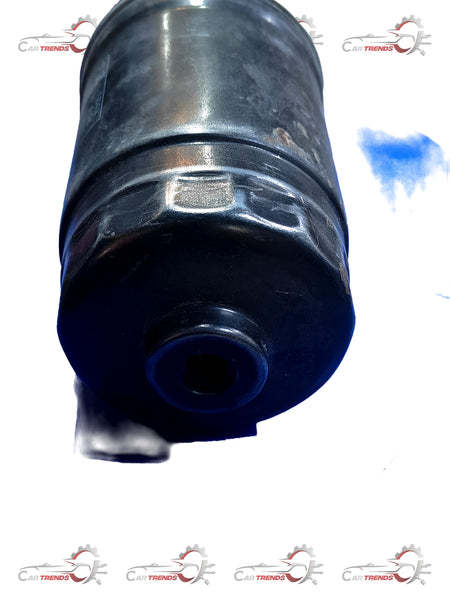 CarTrends fuel filter for Creta, spare part 319222E900, shown in the image with a cylindrical metal design and inlet/outlet ports.
