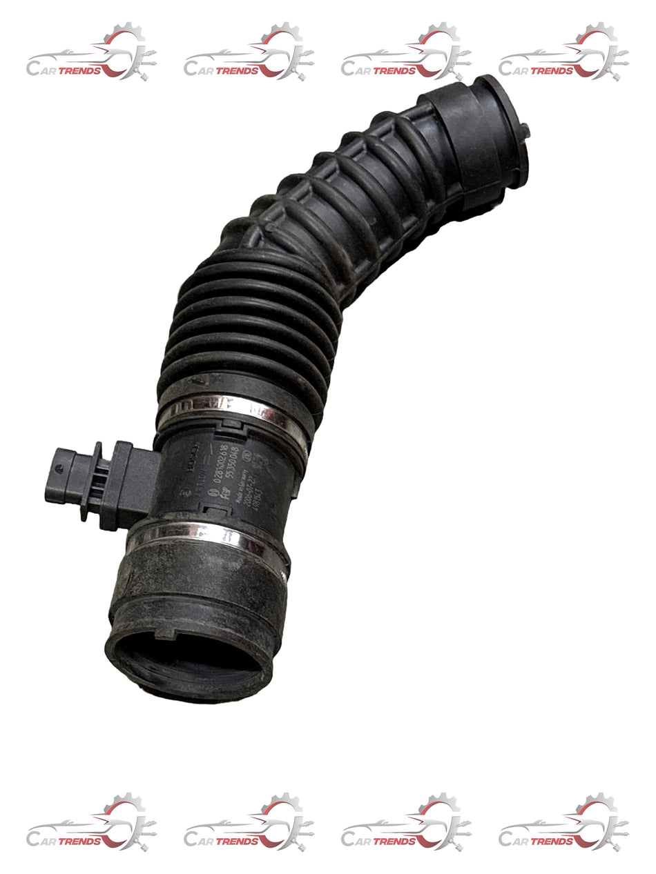 CarTrends Hose Optra Magnum Diesel 2.0 spare part, close-up of the durable rubber hose for vehicle engine use.