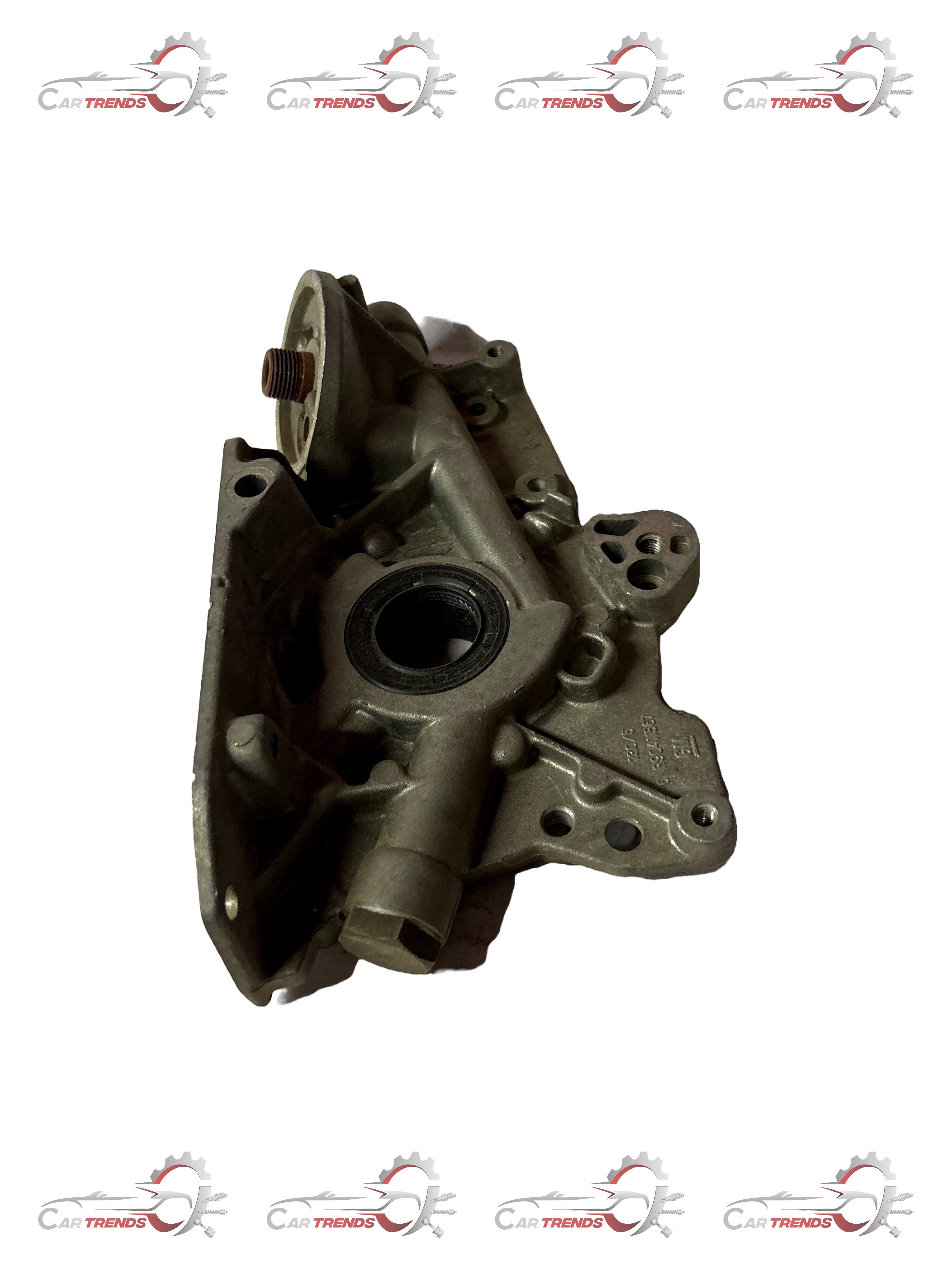 CarTrends oil pump for Optra 1.8 engine, automotive spare part with visible metal components and pump mechanism.