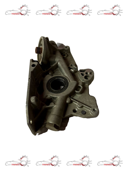 CarTrends oil pump for Optra 1.8 engine, automotive spare part with visible metal components and pump mechanism.