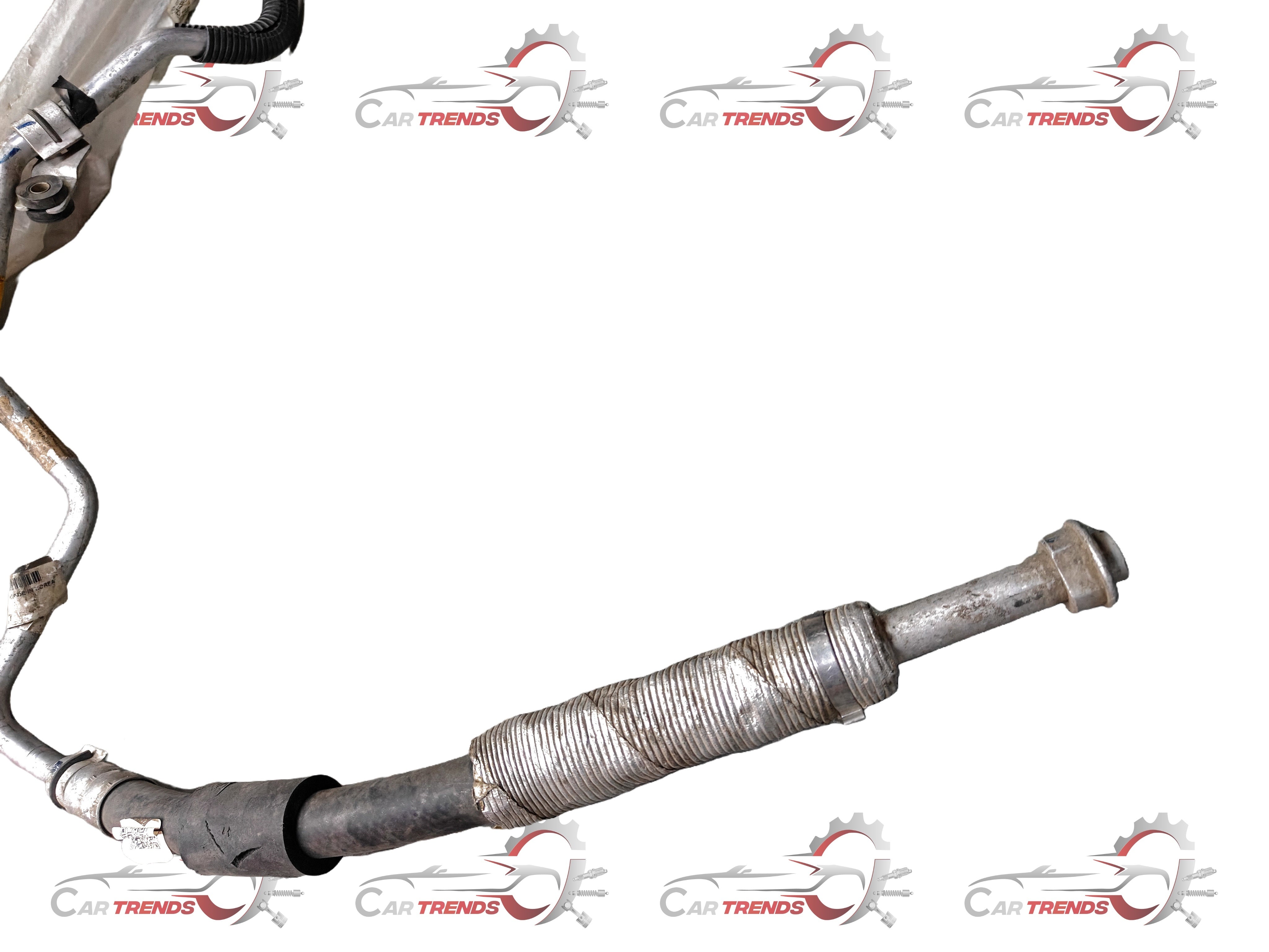 CarTrends Optra petrol air conditioner pipe, automotive spare part for cooling system, shown in the image.