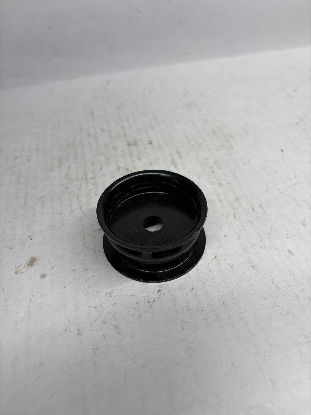 CarTrends rear ABS washer beat, spare car part, close-up view of the white plastic washer used in vehicle brake systems