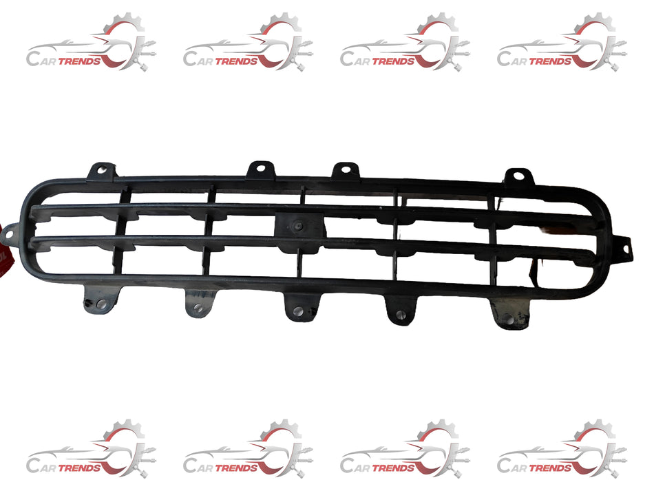 CarTrends lower grille for Tavera T97595506, automotive spare part with a sleek design and cutouts for airflow.