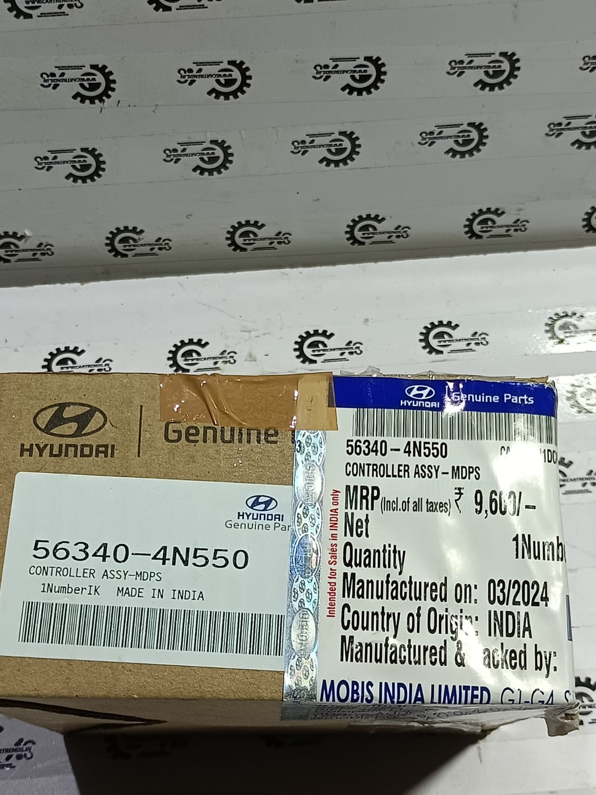 CarTrends power steering module EON 563404N550 spare part for vehicle, shown in close-up image with detailed components
