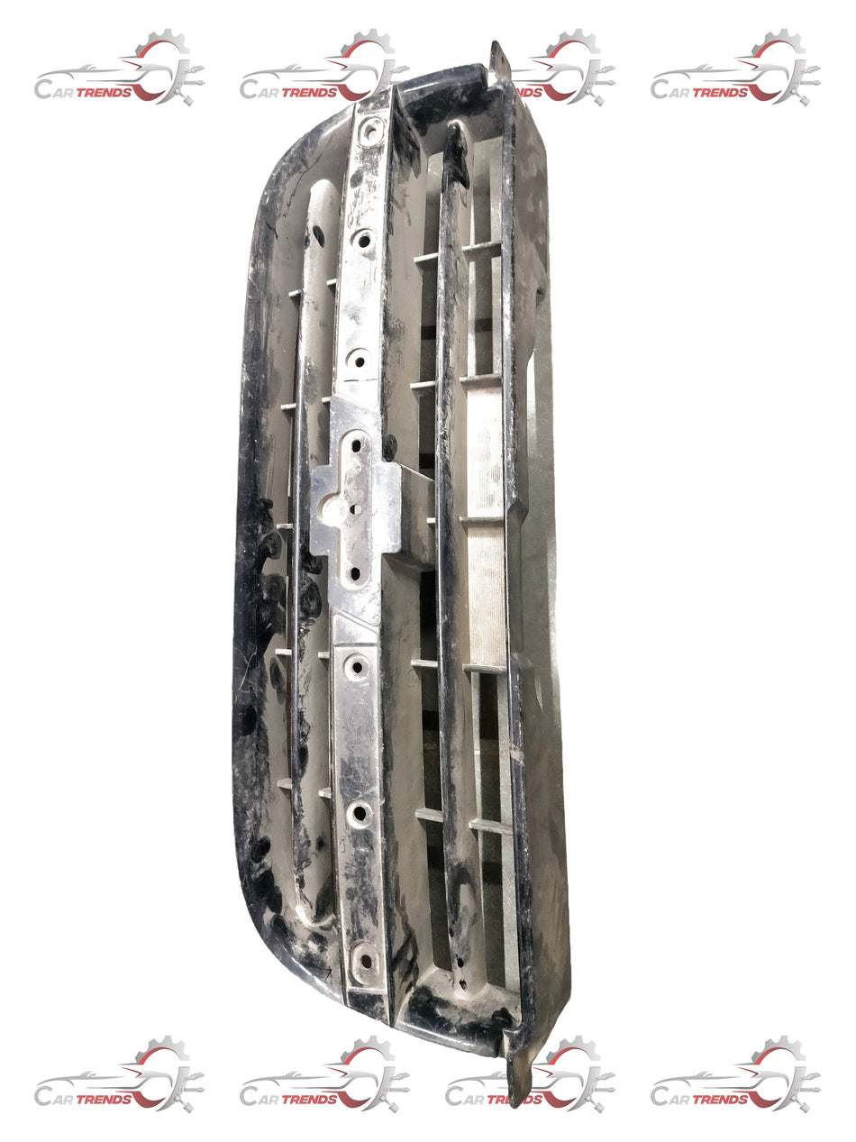 CarTrends radiator grille for Tavera T97595508, spare car part with a metallic finish and mounting points visible.