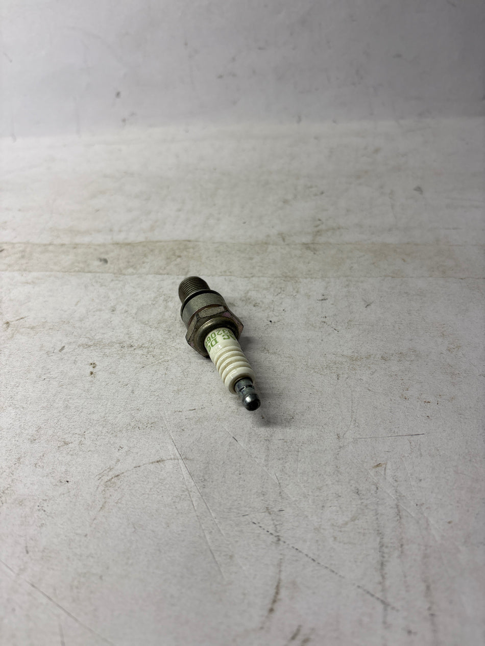 CarTrends Spark Plug Corsa spare part, showing the metal and ceramic components of the automotive spark plug.
