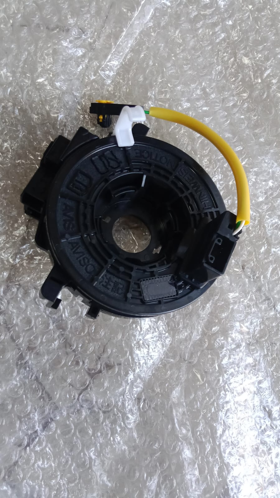 CarTrends steering ribbon for Baleno and Dezire new model, automotive spare part, close-up of the steering ribbon component.