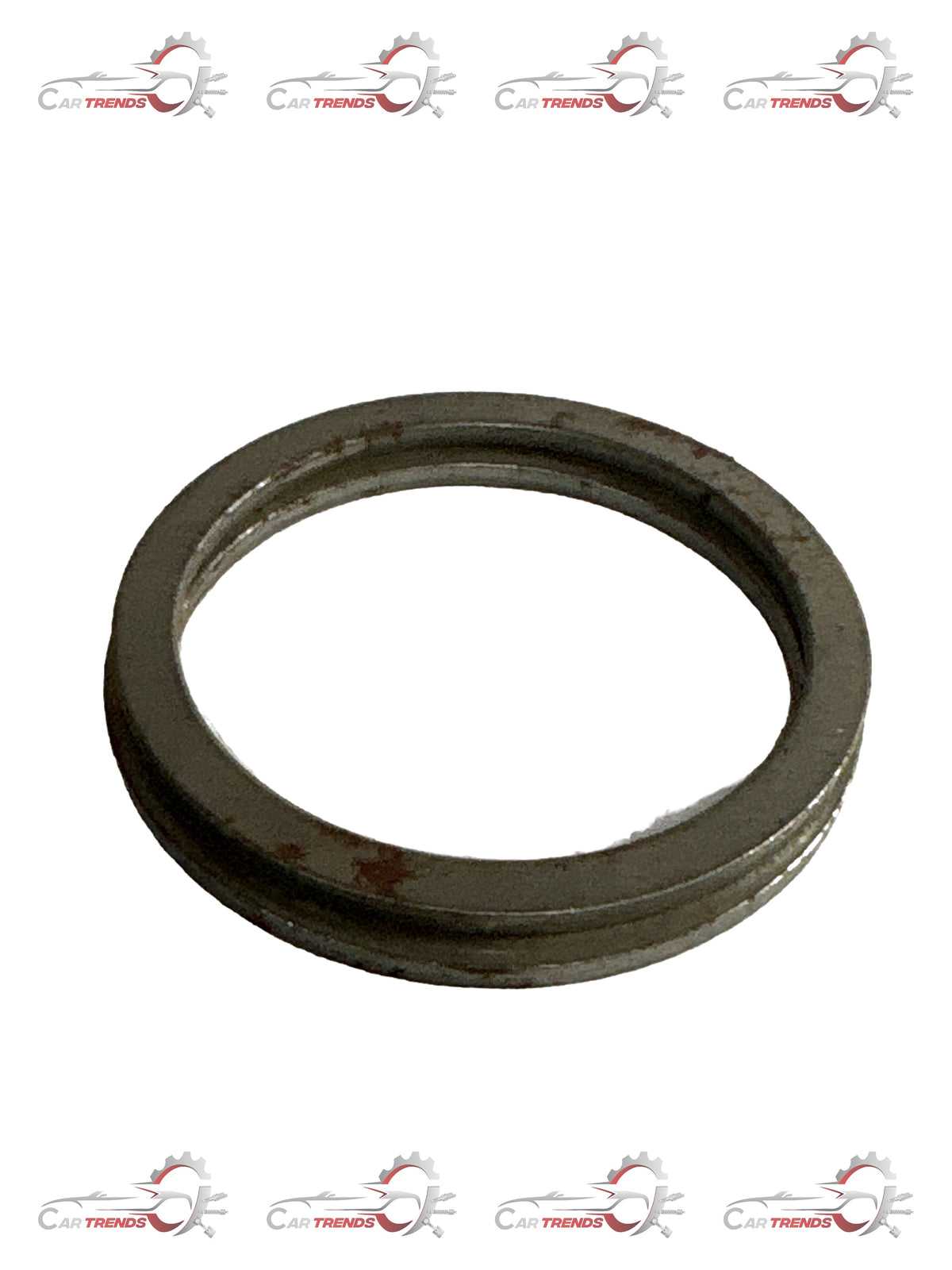 CarTrends Tavera bearing shim, automotive spare part, close-up of metal shim used in vehicle suspension or drivetrain.