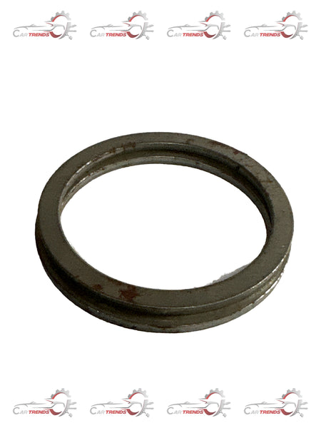 CarTrends Tavera bearing shim, automotive spare part, close-up of metal shim used in vehicle suspension or drivetrain.