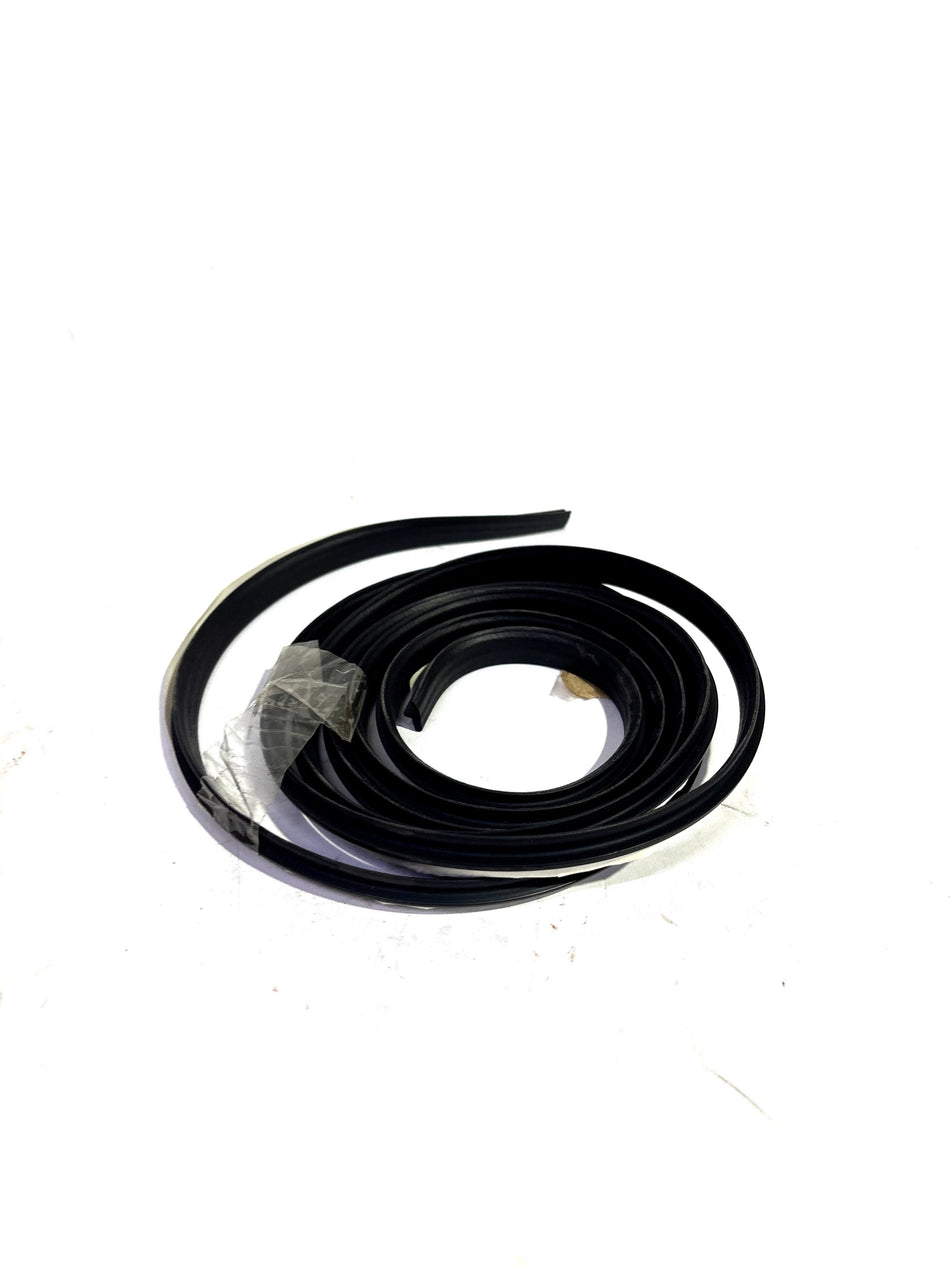 CarTrends Tavera right side window side moulding spare part, close-up view of the vehicle's side trim.