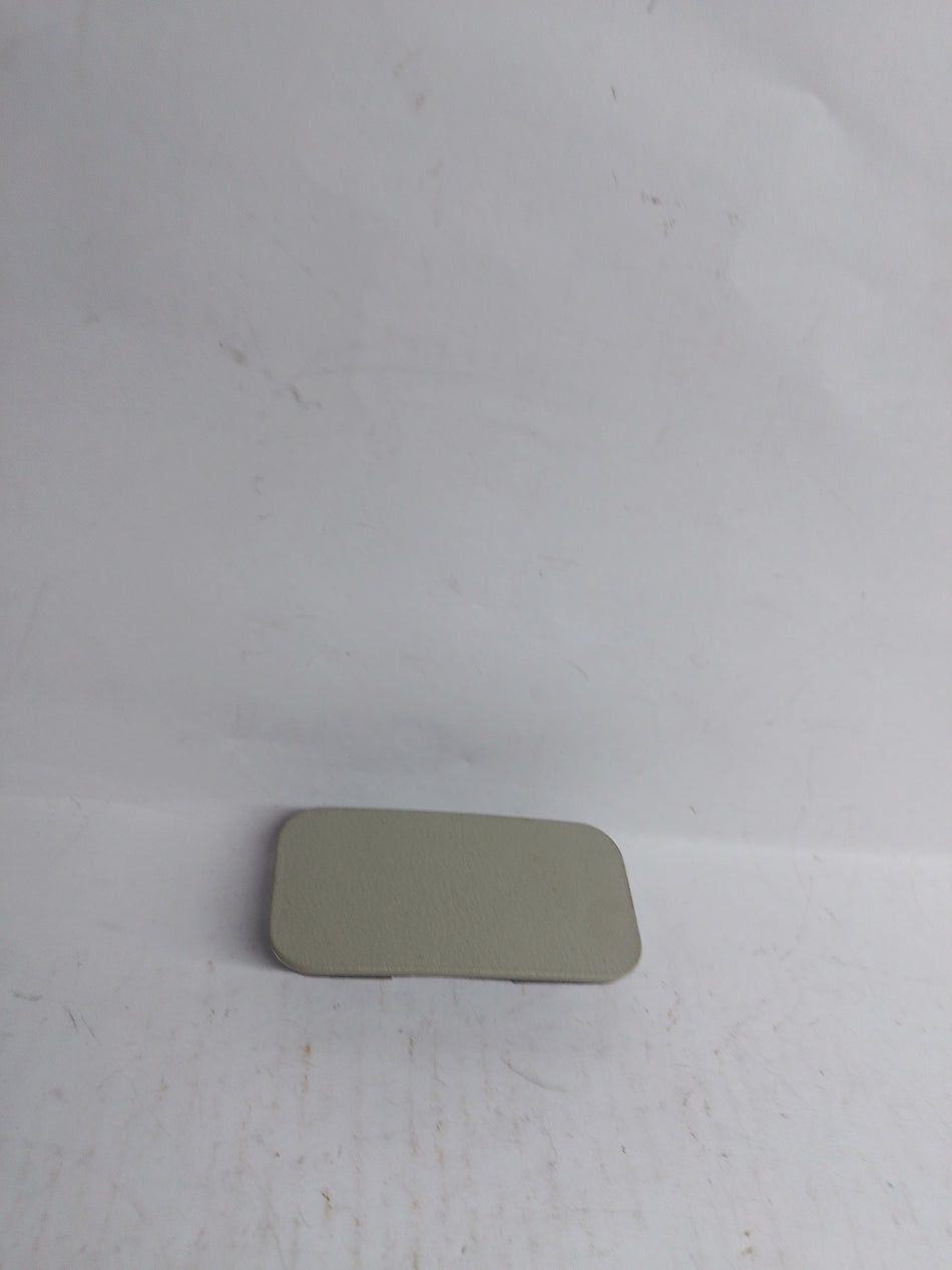 CarTrends T8979568811 Cap Tavera spare part, close-up of the black plastic engine cover cap for Tavera vehicles