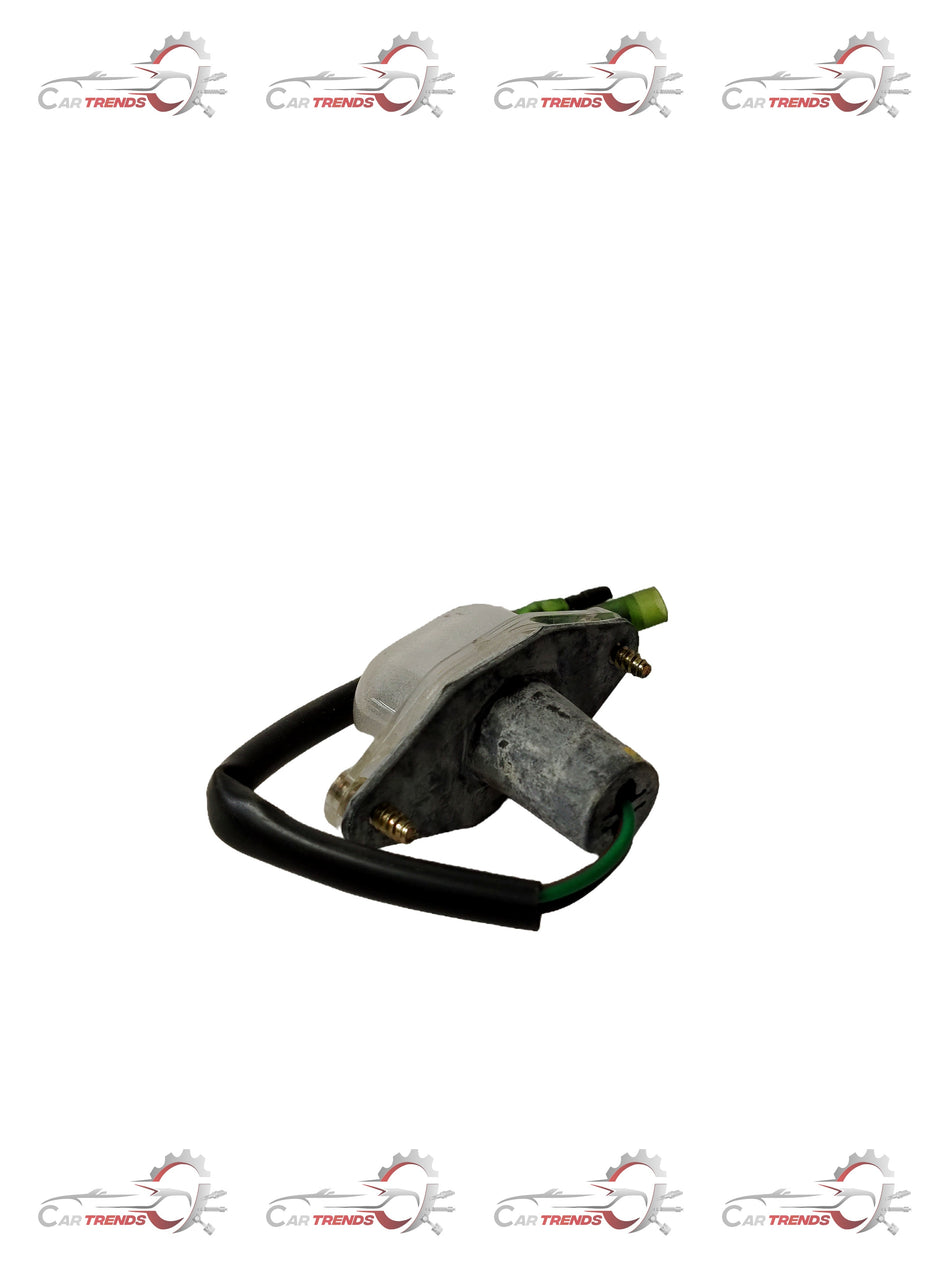 CarTrends T97595111 license plate lamp for Tavera, spare parts showing the lamp installed on a vehicle's rear.