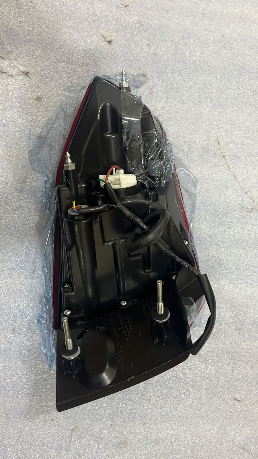 Red tail lamp bulb for Tiago and Tigor, right side, CarTrends spare part, suitable for Tiago and Tigor models.