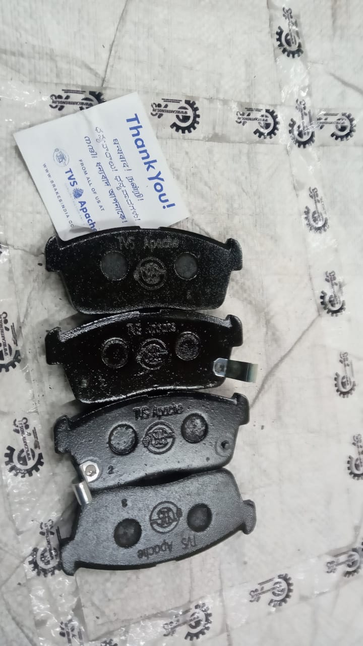 CarTrends TVS front brake pad set for 1.0L LXI manual transmission car, showing the brake pads and packaging.